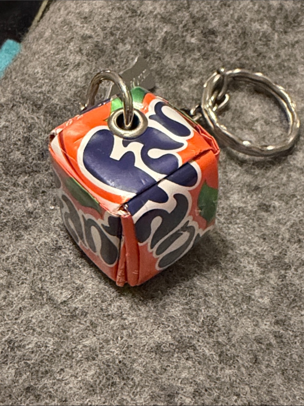 Fanta Orange soda cube keychain Coke women’s global empowerment 5by20 artisan